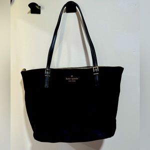Black Kate Spade over the shoulder purse. Used, in great like new condition.